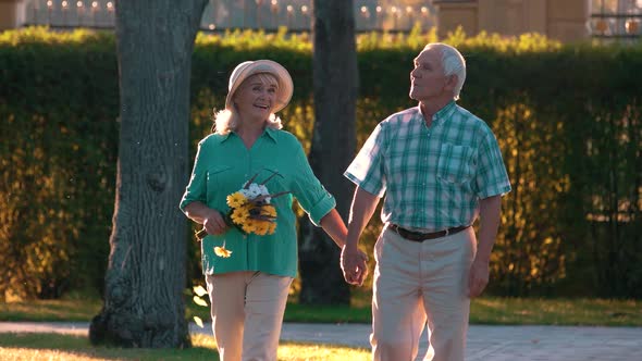 Elderly Couple on Nature Background.