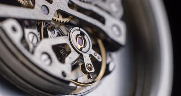 Watch tourbillon rotating macro slowmotion