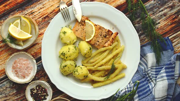 Fresh and Tasty Baked Salmon Served with Young Boiled Potatoes and Yellow Bean