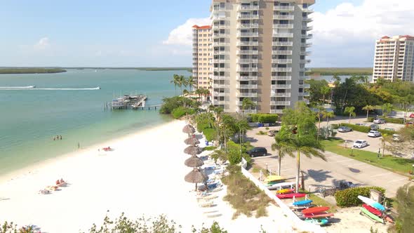 Aerial view of hotels and marina beach club in Lovers Key, Florida