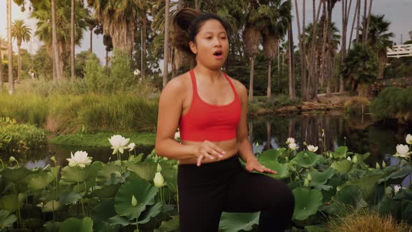 Woman working out in the park alt