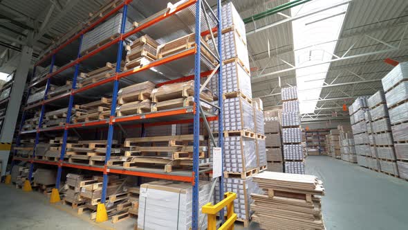 Shelves of Warehouse are Filled With Parquet.