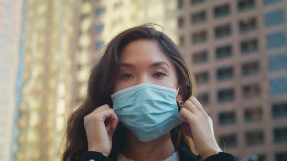 Asian Brunette Take Off Mask Close Up