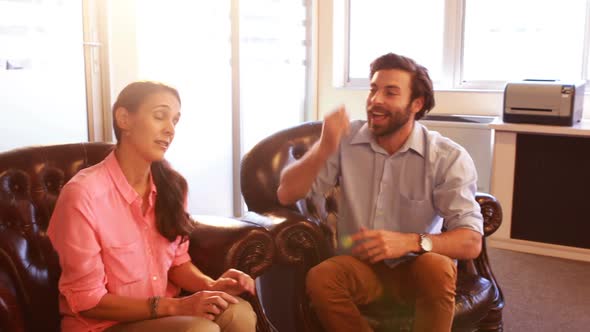 Couple having discussion with therapist