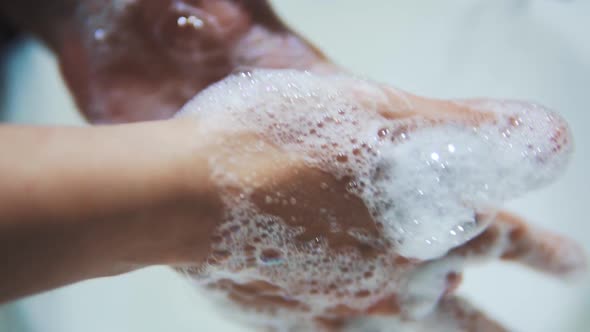 Washing Hands With Soapy Water