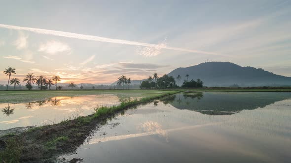 Sunrise reflection Bukit Mertajam hill.