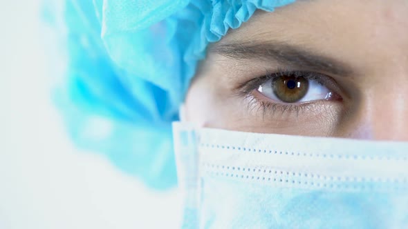 Professional Surgeon in Mask Looking at Camera, Quality Services, Face Closeup