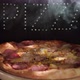 Delicious Fresh Italian Pizza On A Black Background With  The Effect Of Light Inscription Pizza - VideoHive Item for Sale