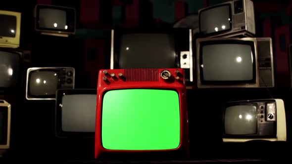 Old TV Green Screen and Stack of Old TV appearing in Background.