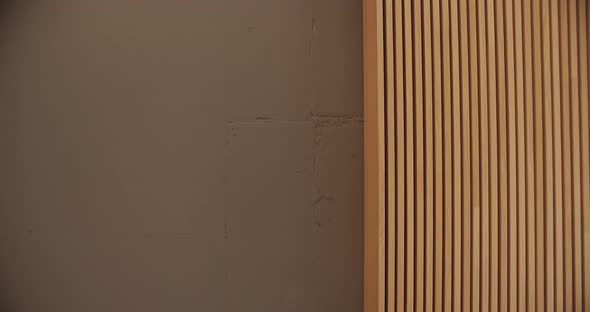 Light Wood Lines in Minimalist Style on the Concrete Ceiling in Modern Interior