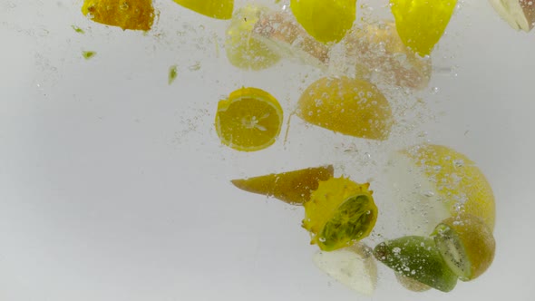 Fruits dropped into water, Ultra Slow Motion alt