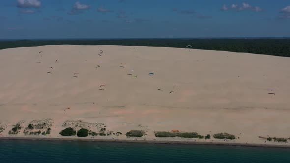 Paragliders Fly Over the Dune of Pilat Dune Du Pilat  Arcachon France