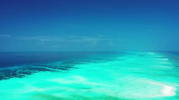 Aerial view scenery of marine lagoon beach adventure by clear sea and white sandy background of a da