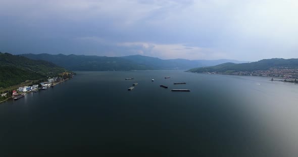 Aerial shot of transport barges floating on the river Danube