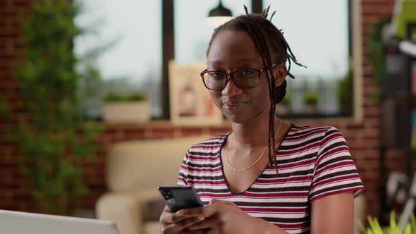 Portrait of Woman Freelancer Texting Messages on Mobile Phone