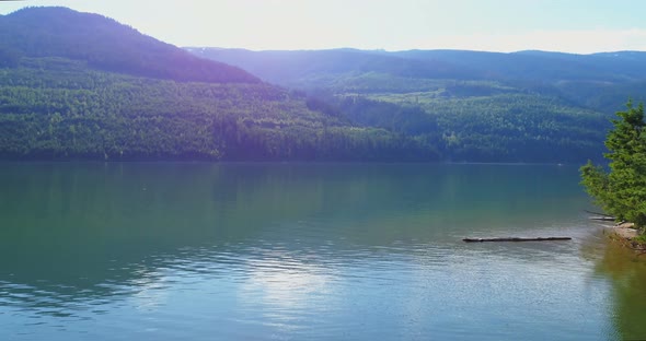 Beautiful river surrounded by mountain range 4k