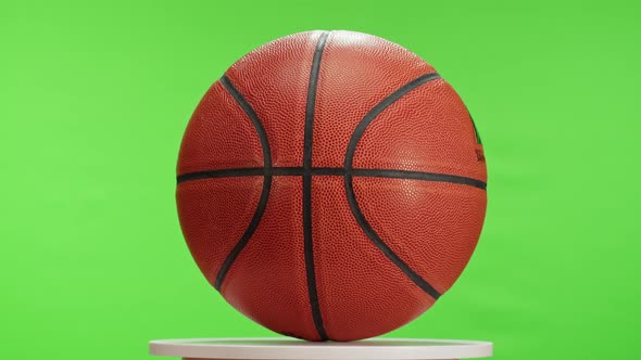 Basketball Ball on Chroma Key Green Background Professional Sport Equipment Closeup Rotating