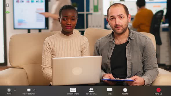 POV of Diverse Colleagues Discussing During Video Meeting