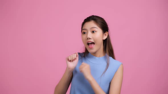 Portrait of beautiful asian woman looking to camera with attractive smile.