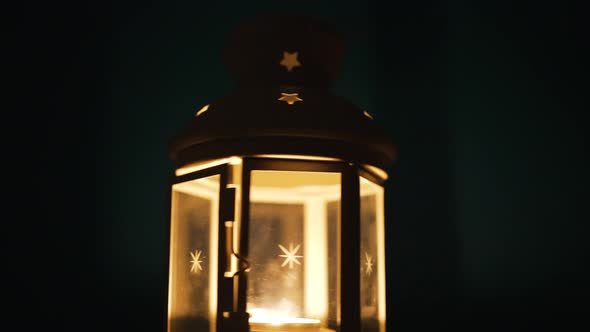 Glass Lantern with Candles Spinning in the Dark