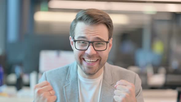 Portrait of Successful Man Celebrating