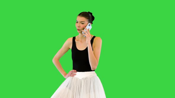 Young Ballerina Making a Phone Call on a Green Screen Chroma Key