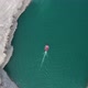 Top view of a mountain river in the canyon and  boat sailing along a turquoise river among the rocks - VideoHive Item for Sale