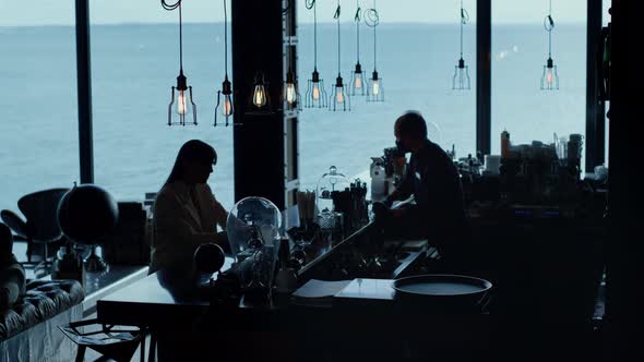 Helpless Businesswoman Silhouette Drinking Cocktail Ocean View