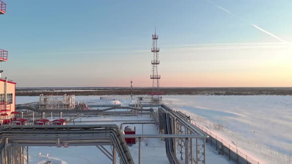 A Drone Flies Over a Pipeline a Gas Pipeline at an Oil and Gas Field in Siberia