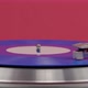 Blue Vinyl Record Spinning on Turntable Isolated on Red - VideoHive Item for Sale