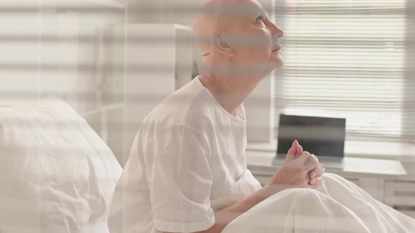 Woman with Cancer Crying in Clinic