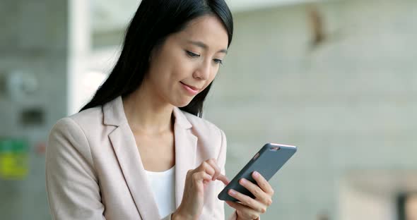 Business woman using cellphone 