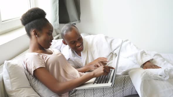 Woman Work on Laptop at Home in the Morning