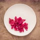 Red cabbage sauerkraut on white ceramic plate - stop motion animation - VideoHive Item for Sale