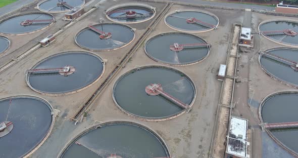 Aerial Top View in Dirty Sewage Water of Wastewater Treatment Process Plant Filtration