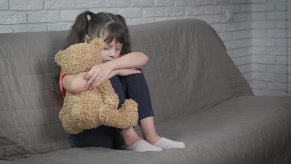 Depression Girl Hugging Toy