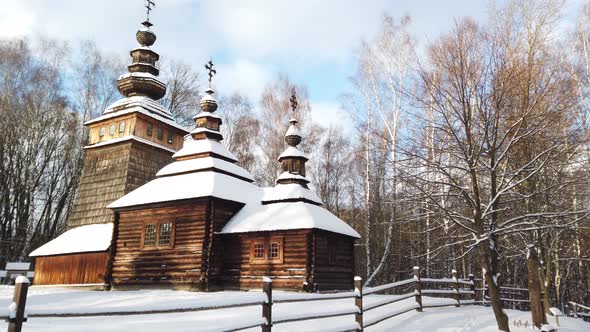 Old Ukrainian traditional vintage village. Elements of architecture. Wooden church.