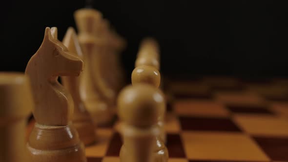 Panning Shot of Wooden Chess in Beginning Position