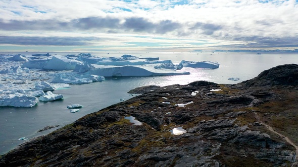 Environment.Greenland. Icebergs. Nature and landscapes of Greenland. Climate change, global warming.