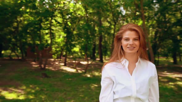 Redhead Female Posing Outdoors