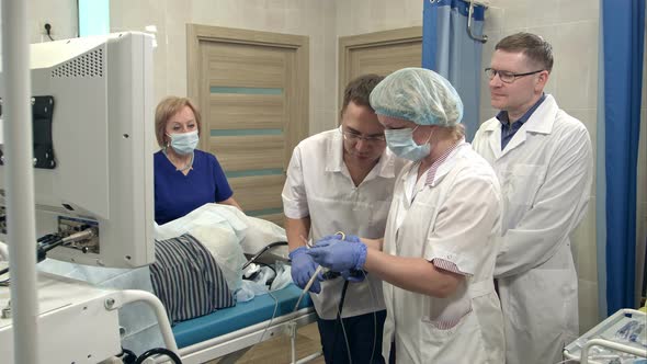 Medical Team Preparing for Endoscopic Surgery