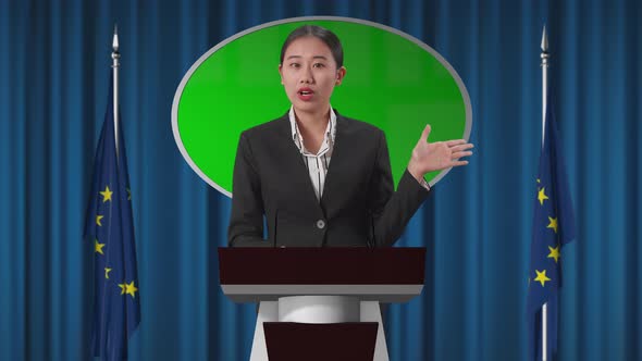 Female Representative At A Press Conference In Government Building With Mock Up Green Screen