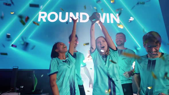 Slow Motion Emotions of Victory the Team of Esports Players Rejoices at the Victory in the