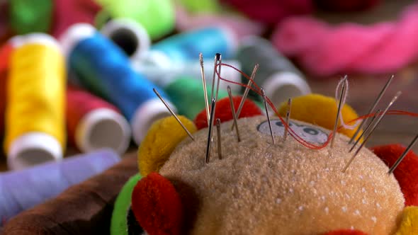 Spools of Colored Thread Close-up. Textile Industry. Sew with a Needle and Thread. Embroider on