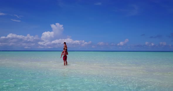 Romantic people after marriage in love live the dream on beach on paradise white sand 4K background