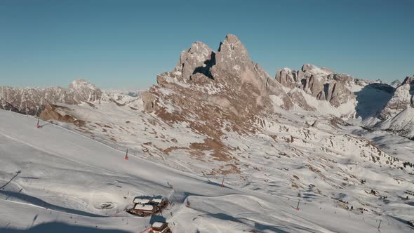 Establishing drone shot over Seceda ski slope italian dolomites