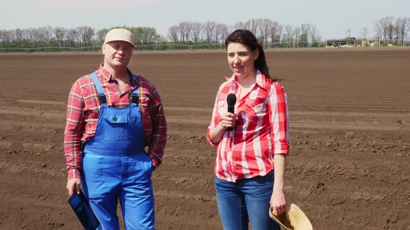 the Journalist Interviews the Farmer for TV News Report About Modern Agriculturally Cultivation