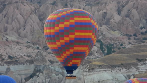 Hot Air Balloon Rising and Flying at Sunrise Morning