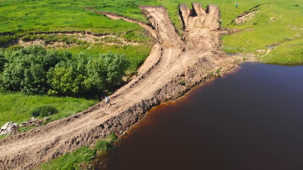 Man Walks Along Bulk Road