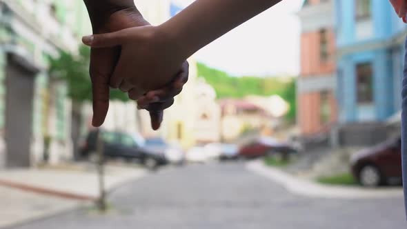 Happy Couple Walking in City Holding Hands, Travelling Together, Outdoor Date